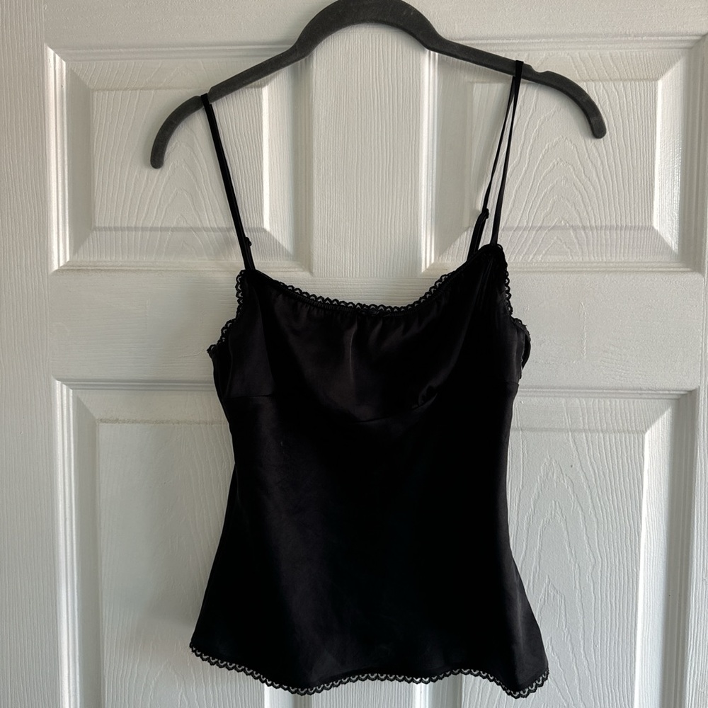 WILFRED black silk babydoll top. Lace trim and small rose detailing. Size xs.